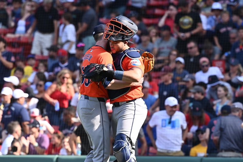 Aug 11, 2024; Boston, Massachusetts, USA; Houston Astros pitcher Shawn Dubin (66)  and catcher Yainer Diaz (21) celebrate beating the Boston Red Sox at Fenway Park. Mandatory Credit: Eric Canha-USA TODAY Sports