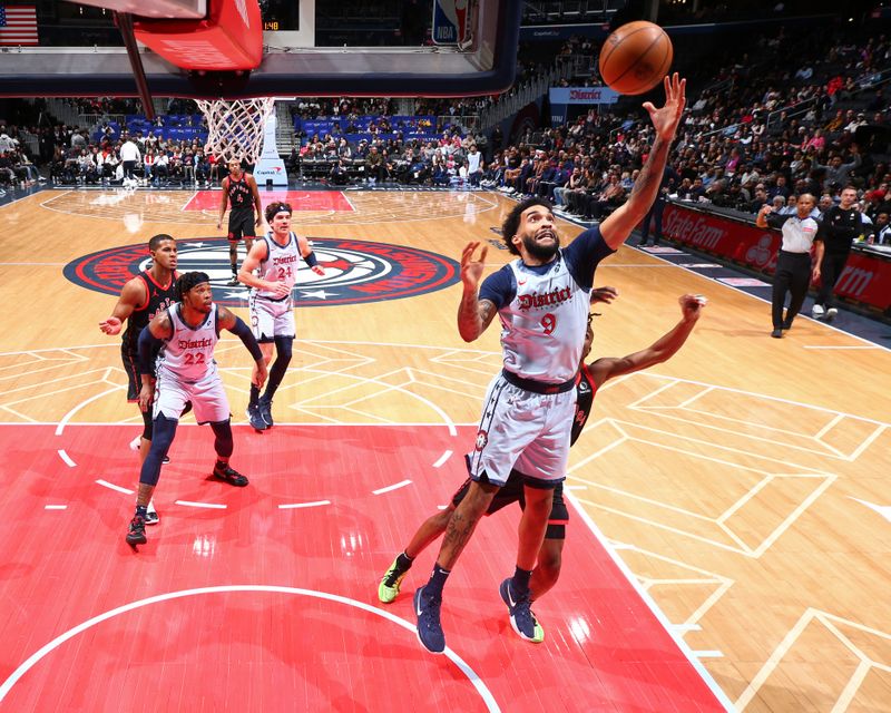 WASHINGTON, DC -?JANUARY 29: Justin Champagnie #9 of the Washington Wizards rebounds during the game against the Toronto Raptors on January 29, 2025 at Capital One Arena in Washington, DC. NOTE TO USER: User expressly acknowledges and agrees that, by downloading and or using this Photograph, user is consenting to the terms and conditions of the Getty Images License Agreement. Mandatory Copyright Notice: Copyright 2025 NBAE (Photo by Stephen Gosling/NBAE via Getty Images)