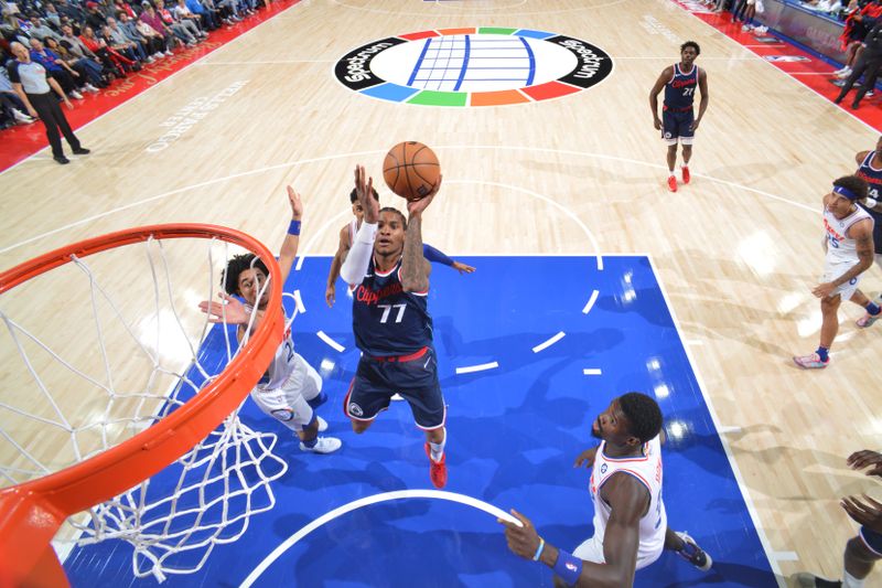 PHILADELPHIA, PA - NOVEMBER 24: Kevin Porter Jr. #77 of the LA Clippers drives to the basket during the game against the Philadelphia 76ers on November 24, 2024 at the Wells Fargo Center in Philadelphia, Pennsylvania NOTE TO USER: User expressly acknowledges and agrees that, by downloading and/or using this Photograph, user is consenting to the terms and conditions of the Getty Images License Agreement. Mandatory Copyright Notice: Copyright 2024 NBAE (Photo by Jesse D. Garrabrant/NBAE via Getty Images)