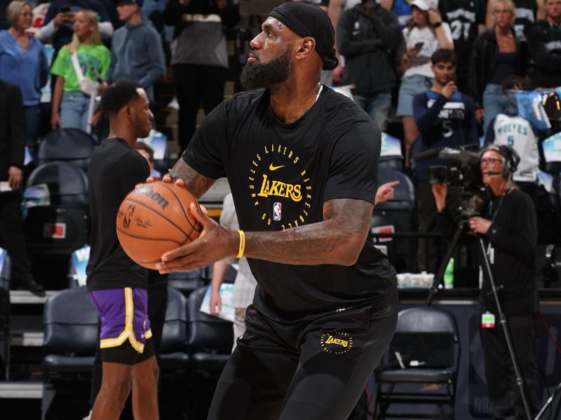 MINNEAPOLIS, MN -  APRIL 25:   LeBron James #23 of the Los Angeles Lakers warms up before the game against the Minnesota Timberwolves during Round 1 Game 3 of the 2025 NBA Playoffs  on April 25, 2025 at Target Center in Minneapolis, Minnesota. NOTE TO USER: User expressly acknowledges and agrees that, by downloading and or using this Photograph, user is consenting to the terms and conditions of the Getty Images License Agreement. Mandatory Copyright Notice: Copyright 2025 NBAE (Photo by David Sherman/NBAE via Getty Images)