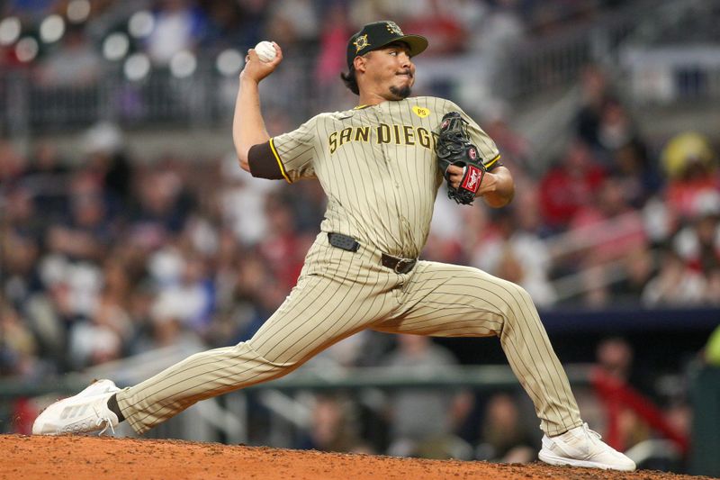 May 17, 2024; Atlanta, Georgia, USA; San Diego Padres relief pitcher Jeremiah Estrada (56) throws against the Atlanta Braves in the ninth inning at Truist Park. Mandatory Credit: Brett Davis-USA TODAY Sports