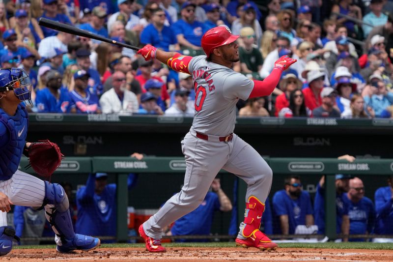 Mar 26, 2024; Mesa, Arizona, USA; St. Louis Cardinals catcher Willson Contreras (40) hits a single against the Chicago Cubs in the first inning at Sloan Park. Mandatory Credit: Rick Scuteri-USA TODAY Sports