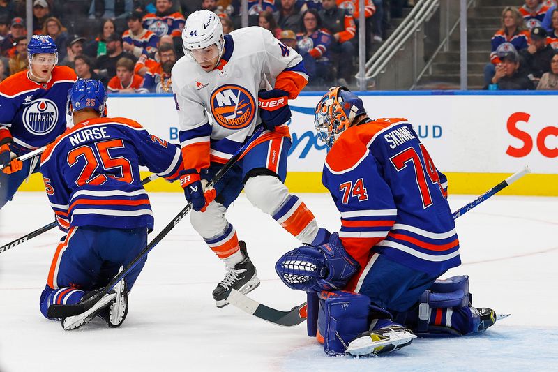 Nov 12, 2024; Edmonton, Alberta, CAN; New York Islanders forward Jean-Gabriel Pageau (44) tries to screen Edmonton Oilers goaltender Stuart Skinner (74) during the second period at Rogers Place. Mandatory Credit: Perry Nelson-Imagn Images