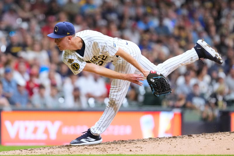 Sep 27, 2025; Milwaukee, Wisconsin, USA;  Milwaukee Brewers pitcher Jacob Misiorowski (32) throws a pitch during the fourth inning against the Cincinnati Reds at American Family Field. Mandatory Credit: Jeff Hanisch-Imagn Images