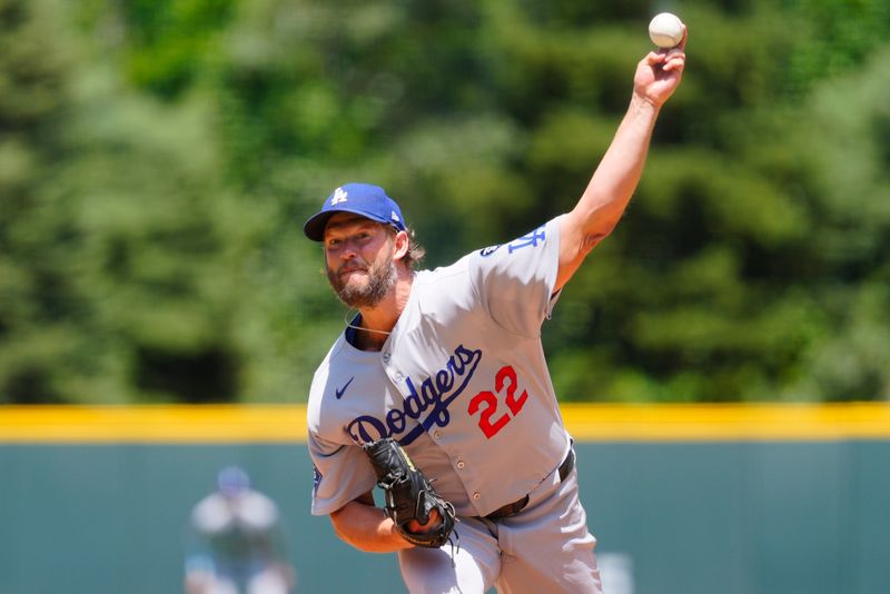Jun 26, 2025; Denver, Colorado, USA; Los Angeles Dodgers starting pitcher Clayton Kershaw (22) delivers a pitch in the first inning against the Colorado Rockies at Coors Field. Mandatory Credit: Ron Chenoy-Imagn Images