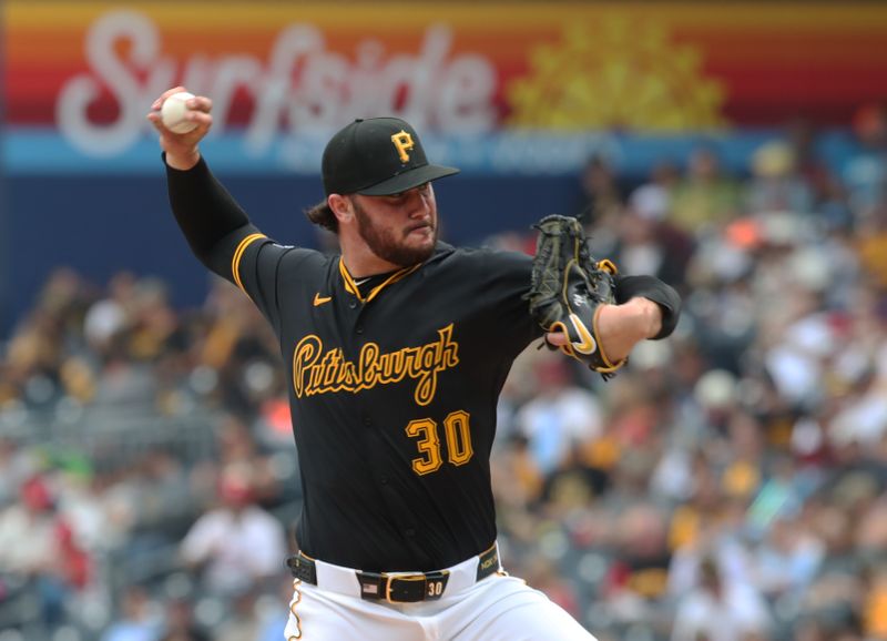 Jun 8, 2025; Pittsburgh, Pennsylvania, USA; Pittsburgh Pirates starting pitcher Paul Skenes (30) pitches against the Philadelphia Phillies during the fourth inning at PNC Park. Mandatory Credit: Charles LeClaire-Imagn Images