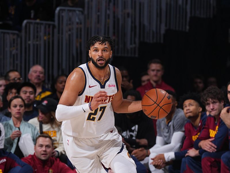 DENVER, CO - OCTOBER 13: Jamal Murray #27 of the Denver Nuggets dribbles the ball during the game against the Phoenix Suns on October 13, 2024 at Ball Arena in Denver, Colorado. NOTE TO USER: User expressly acknowledges and agrees that, by downloading and/or using this Photograph, user is consenting to the terms and conditions of the Getty Images License Agreement. Mandatory Copyright Notice: Copyright 2024 NBAE (Photo by Bart Young/NBAE via Getty Images)