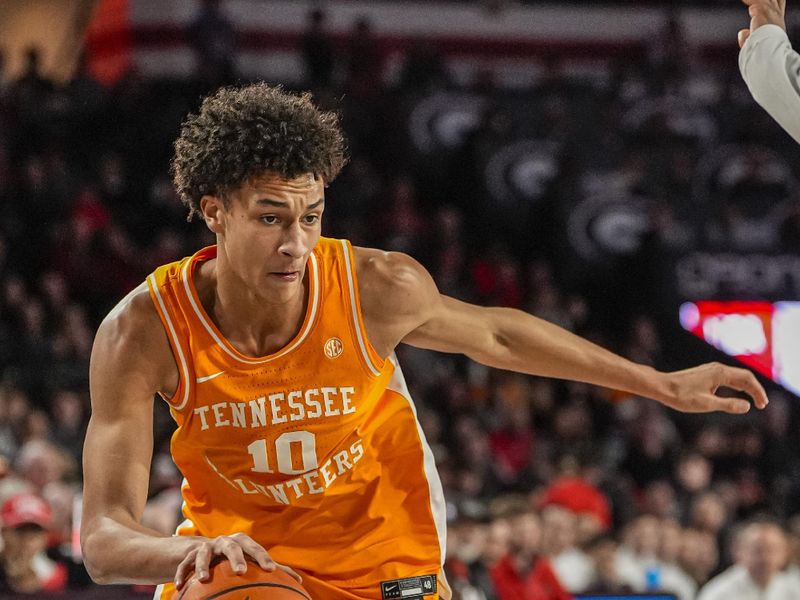 Jan 28, 2026; Athens, Georgia, USA; Tennessee Volunteers forward Nate Ament (10) dribbles against the Georgia Bulldogs during the second half at Stegeman Coliseum. Mandatory Credit: Dale Zanine-Imagn Images