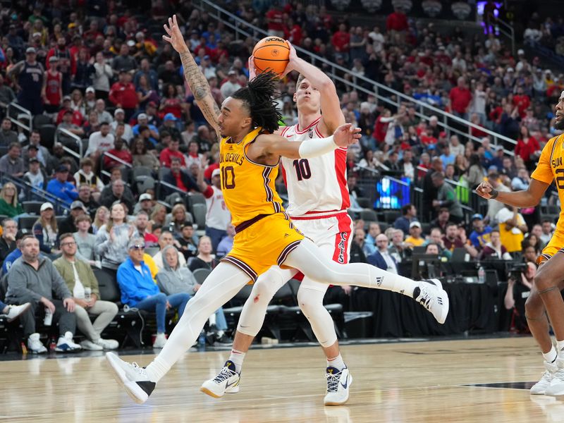 Mar 10, 2023; Las Vegas, NV, USA; Arizona State Sun Devils guard Frankie Collins (10) defends against a shot attempt by Arizona Wildcats forward Azuolas Tubelis (10) during the second half at T-Mobile Arena. Mandatory Credit: Stephen R. Sylvanie-USA TODAY Sports