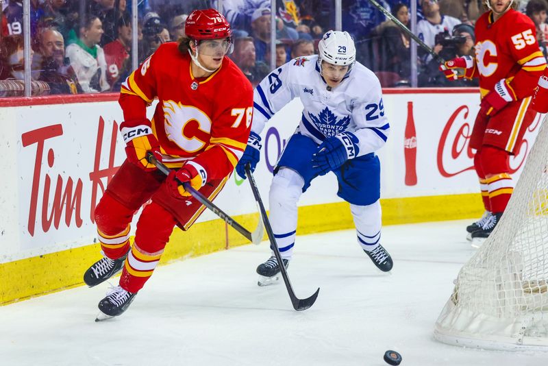 Jan 18, 2024; Calgary, Alberta, CAN; Calgary Flames center Martin Pospisil (76) controls the puck against the Toronto Maple Leafs during the first period at Scotiabank Saddledome. Mandatory Credit: Sergei Belski-USA TODAY Sports