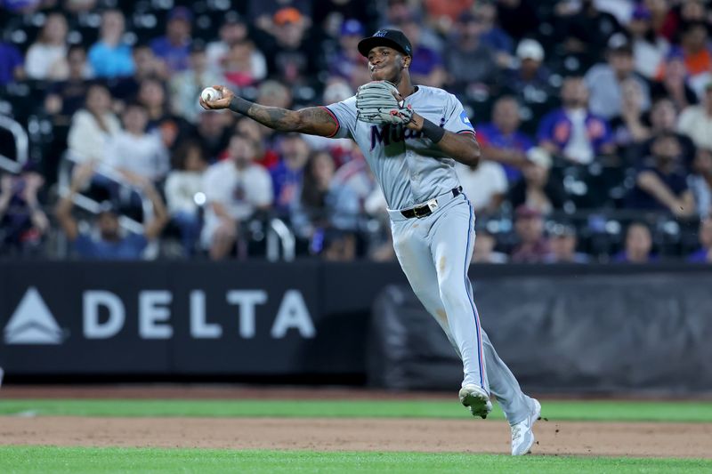 Jun 13, 2024; New York City, New York, USA; Miami Marlins shortstop Tim Anderson (7) throws to first base to force out New York Mets third baseman Mark Vientos (not pictured) to end the seventh inning at Citi Field. Mandatory Credit: Brad Penner-USA TODAY Sports