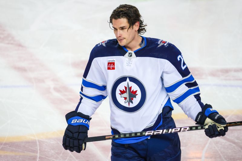 Feb 19, 2024; Calgary, Alberta, CAN; Winnipeg Jets center Sean Monahan (23) skates during the warmup period against the Calgary Flames at Scotiabank Saddledome. Mandatory Credit: Sergei Belski-USA TODAY Sports