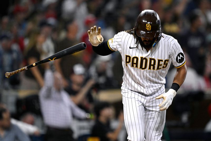 Sep 5, 2023; San Diego, California, USA; San Diego Padres right fielder Fernando Tatis Jr. (23) tosses his bat after hitting a home run against the Philadelphia Phillies during the fourth inning at Petco Park. Mandatory Credit: Orlando Ramirez-USA TODAY Sports