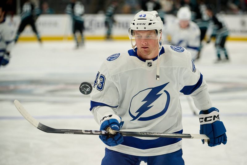 Mar 21, 2024; San Jose, California, USA; Tampa Bay Lightning defenseman Darren Raddysh (43) juggles the puck with his stick during warmups before the game against the San Jose Sharks at SAP Center at San Jose. Mandatory Credit: Robert Edwards-USA TODAY Sports