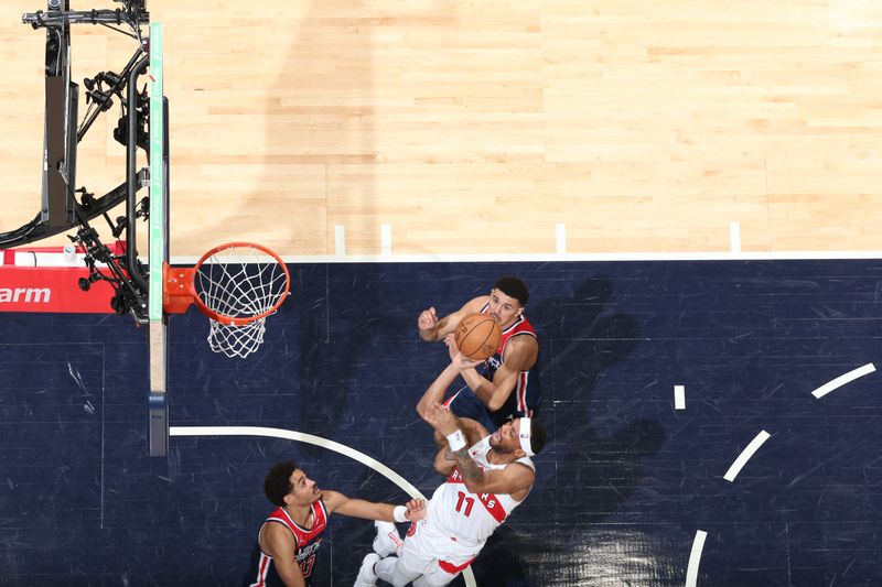 WASHINGTON, DC -? MARCH 23:  Bruce Brown #11 of the Toronto Raptors goes to the basket during the game on March 23, 2024 at Capital One Arena in Washington, DC. NOTE TO USER: User expressly acknowledges and agrees that, by downloading and or using this Photograph, user is consenting to the terms and conditions of the Getty Images License Agreement. Mandatory Copyright Notice: Copyright 2024 NBAE (Photo by Stephen Gosling/NBAE via Getty Images)