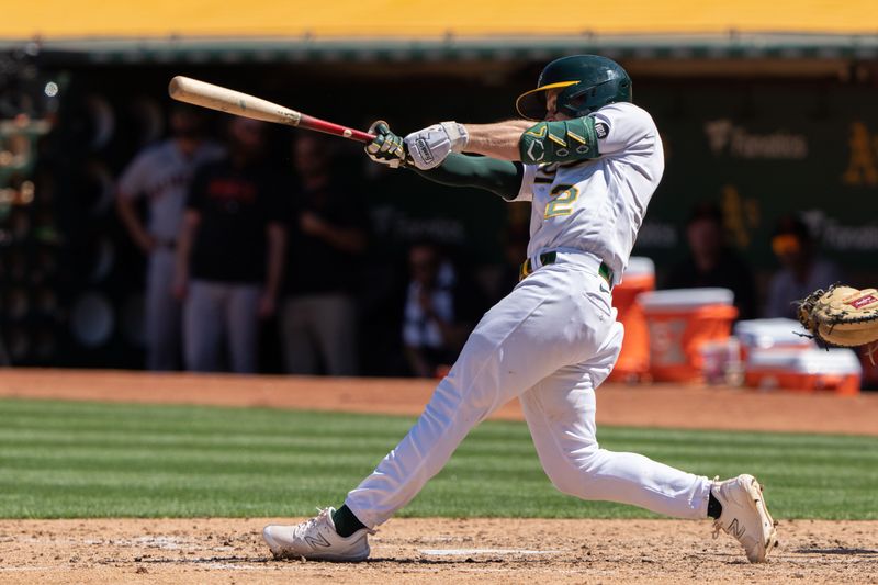 Aug 6, 2023; Oakland, California, USA;  Oakland Athletics shortstop Nick Allen (2) hits a solo home run during the fifth inning against the San Francisco Giants at Oakland-Alameda County Coliseum. Mandatory Credit: Stan Szeto-USA TODAY Sports