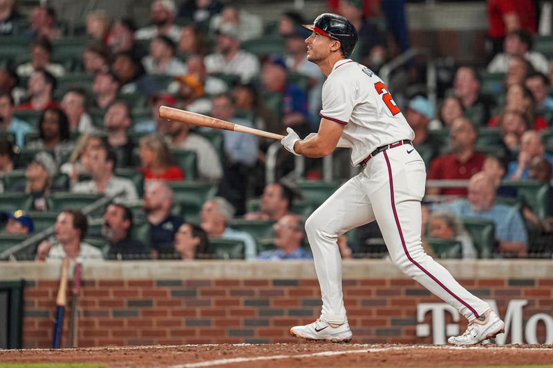 May 14, 2024; Cumberland, Georgia, USA; Atlanta Braves first baseman Matt Olson (28) watches his fly ball caught in center field during the sixth inning at Truist Park. Mandatory Credit: Dale Zanine-USA TODAY Sports