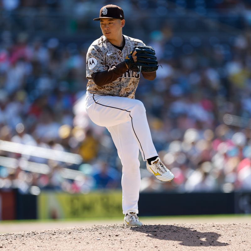 Aug 4, 2024; San Diego, California, USA; San Diego Padres relief pitcher Yuki Matsui (1) throws a pitch during the ninth inning against the Colorado Rockies at Petco Park. Mandatory Credit: David Frerker-USA TODAY Sports