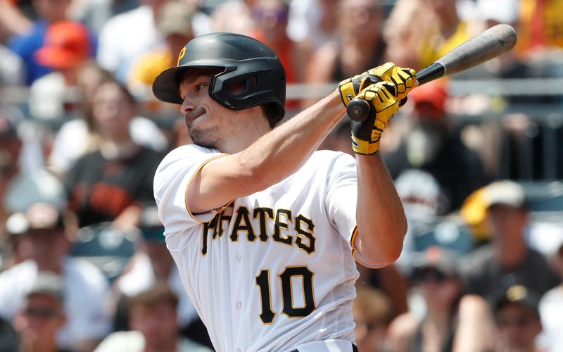 Jul 16, 2023; Pittsburgh, Pennsylvania, USA; Pittsburgh Pirates center fielder Bryan Reynolds (10) hits an RBI single against the San Francisco Giants during the second inning at PNC Park. Mandatory Credit: Charles LeClaire-USA TODAY Sports