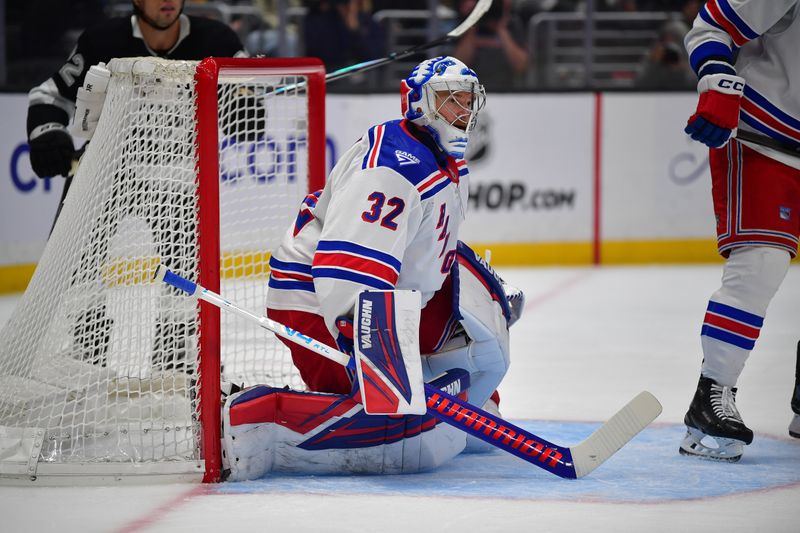Jan 20, 2026; Los Angeles, California, USA; New York Rangers goaltender Jonathan Quick (32) defends the goal against the Los Angeles Kings during the second period at Crypto.com Arena. Mandatory Credit: Gary A. Vasquez-Imagn Images