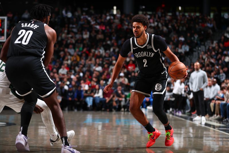 BROOKLYN, NY - DECEMBER 8: Cameron Johnson #2 of the Brooklyn Nets dribbles the ball during the game against the Milwaukee Bucks on December 8, 2024 at Barclays Center in Brooklyn, New York. NOTE TO USER: User expressly acknowledges and agrees that, by downloading and or using this Photograph, user is consenting to the terms and conditions of the Getty Images License Agreement. Mandatory Copyright Notice: Copyright 2024 NBAE (David L. Nemec/NBAE via Getty Images)