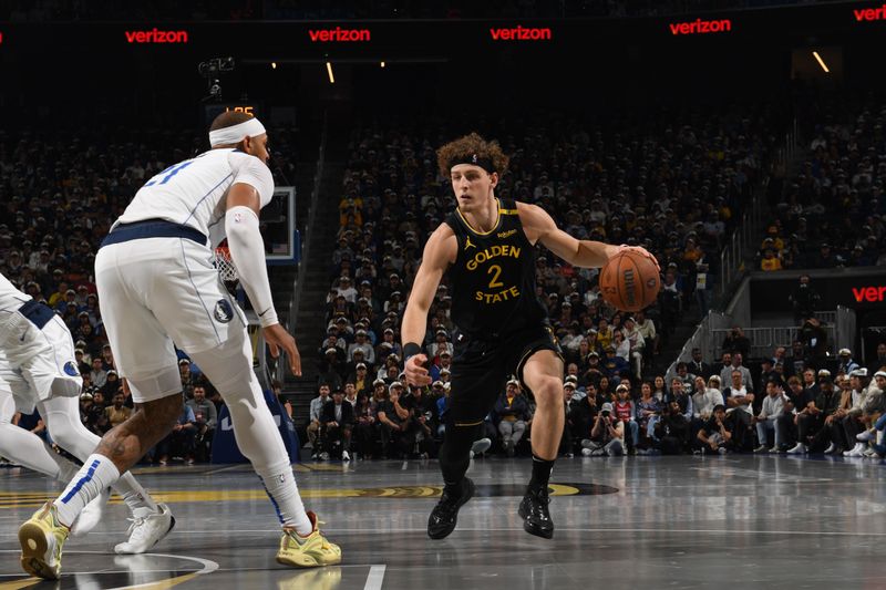 SAN FRANCISCO, CA - NOVEMBER 12: Brandin Podziemski #2 of the Golden State Warriors drives to the basket during the game against the Dallas Mavericks during the Emirates NBA Cup game on November 12, 2024 at Chase Center in San Francisco, California. NOTE TO USER: User expressly acknowledges and agrees that, by downloading and or using this photograph, user is consenting to the terms and conditions of Getty Images License Agreement. Mandatory Copyright Notice: Copyright 2024 NBAE (Photo by Noah Graham/NBAE via Getty Images)