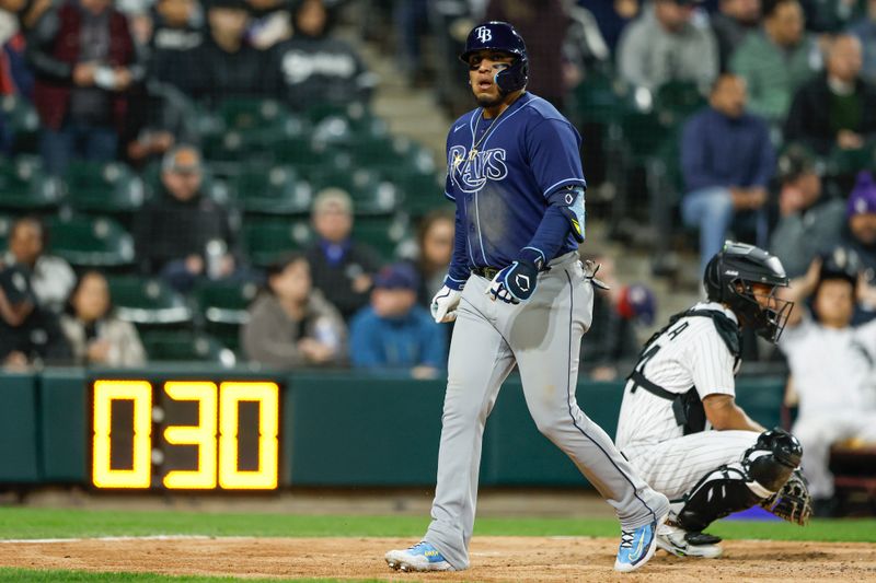 Apr 28, 2023; Chicago, Illinois, USA; Tampa Bay Rays third baseman Isaac Paredes (17) reacts as he crosses home plate after hitting a solo home run against the Chicago White Sox during the ninth inning at Guaranteed Rate Field. Mandatory Credit: Kamil Krzaczynski-USA TODAY Sports