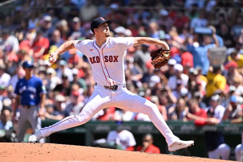 Jun 29, 2025; Boston, Massachusetts, USA; Boston Red Sox starting pitcher Walker Buehler (0) pitches against the Toronto Blue Jays during the fourth inning at Fenway Park. Mandatory Credit: Eric Canha-Imagn Images