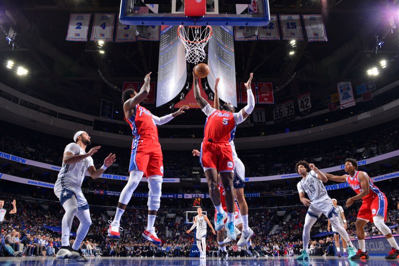 PHILADELPHIA, PA - DECEMBER 6: Andre Drummond #5 of the Philadelphia 76ers rebounds the ball during the game against the Orlando Magic on December 6, 2024 at the Wells Fargo Center in Philadelphia, Pennsylvania NOTE TO USER: User expressly acknowledges and agrees that, by downloading and/or using this Photograph, user is consenting to the terms and conditions of the Getty Images License Agreement. Mandatory Copyright Notice: Copyright 2024 NBAE (Photo by Jesse D. Garrabrant/NBAE via Getty Images)