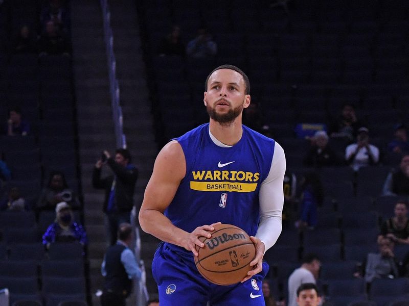 SAN FRANCISCO, CA - MARCH 24: Stephen Curry #30 of the Golden State Warriors warms up before the game against the Philadelphia 76ers on March 24, 2023 at Chase Center in San Francisco, California. NOTE TO USER: User expressly acknowledges and agrees that, by downloading and or using this photograph, user is consenting to the terms and conditions of Getty Images License Agreement. Mandatory Copyright Notice: Copyright 2023 NBAE (Photo by Noah Graham/NBAE via Getty Images)