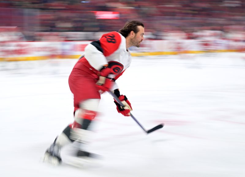 Mar 24, 2026; Montreal, Quebec, CAN; Carolina Hurricanes forward William Carrier (28) skates during the warmup before a game against the Montreal Canadiens at the Bell Centre. Mandatory Credit: Eric Bolte-Imagn Images