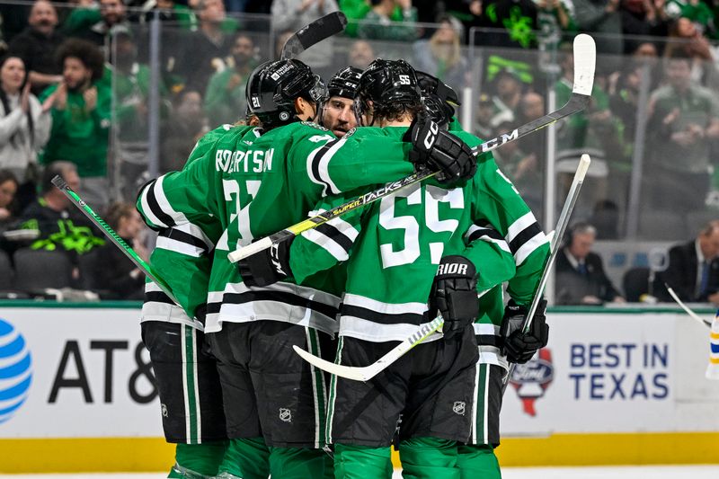 Apr 9, 2024; Dallas, Texas, USA; Dallas Stars defenseman Chris Tanev (3) and center Joe Pavelski (16) and defenseman Thomas Harley (55) celebrates a goal scored by Pavelski against the Buffalo Sabres during the second period at the American Airlines Center. Mandatory Credit: Jerome Miron-USA TODAY Sports