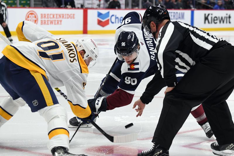 Nov 11, 2024; Denver, Colorado, USA; Nashville Predators center Steven Stamkos (91) and Colorado Avalanche right wing Mikko Rantanen (96) face off during the second period at Ball Arena. Mandatory Credit: Christopher Hanewinckel-Imagn Images