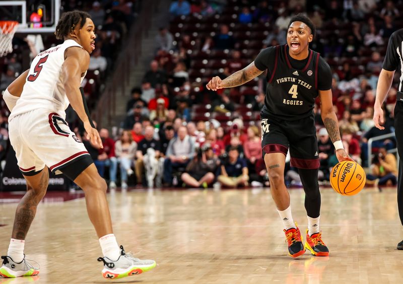 Jan 14, 2023; Columbia, South Carolina, USA; Texas A&M Aggies guard Wade Taylor IV (4) brings the ball up as South Carolina Gamecocks guard Meechie Johnson (5) defends in the second half at Colonial Life Arena. Mandatory Credit: Jeff Blake-USA TODAY Sports