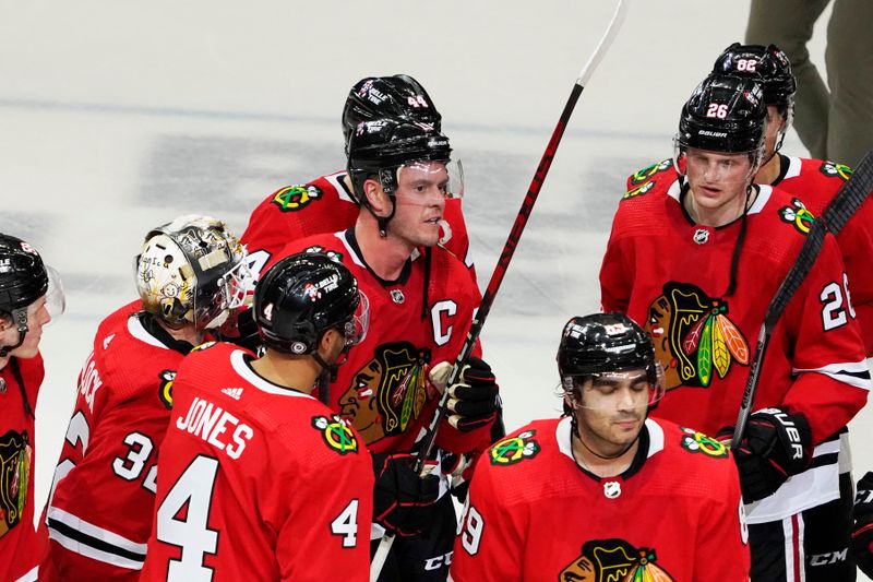 Apr 13, 2023; Chicago, Illinois, USA; Chicago Blackhawks center Jonathan Toews (19) is honored after the game against the Philadelphia Flyers. He played his last game as a Blackhawk, at United Center. Mandatory Credit: David Banks-USA TODAY Sports