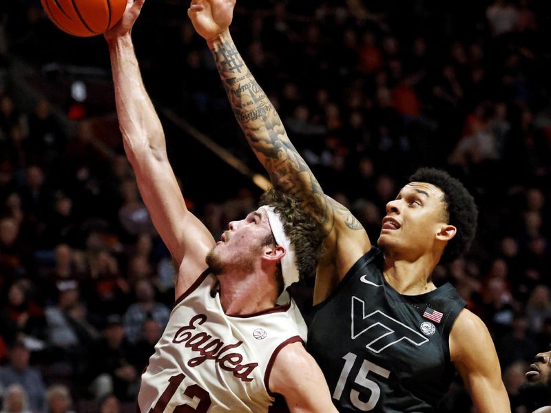 Jan 23, 2024; Blacksburg, Virginia, USA; Boston College Eagles forward Quinten Post (12) and Virginia Tech Hokies center Lynn Kidd (15) go for a rebound during the second half at Cassell Coliseum. Mandatory Credit: Peter Casey-USA TODAY Sports