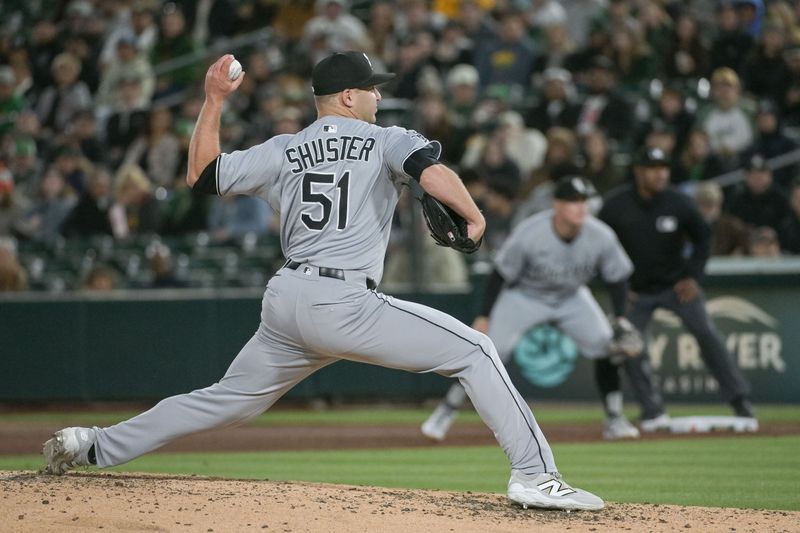 Apr 25, 2025; West Sacramento, California, USA; Chicago White Sox pitcher Jared Shuster (51) throws a pitch against the Athletics during the seventh inning at Sutter Health Park. Mandatory Credit: Ed Szczepanski-Imagn Images