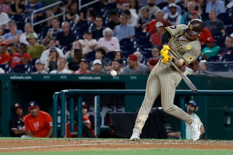 Jul 24, 2024; Washington, District of Columbia, USA; San Diego Padres outfielder Jackson Merrill (3) singles against the Washington Nationals during the eighth inning at Nationals Park. Mandatory Credit: Geoff Burke-USA TODAY Sports