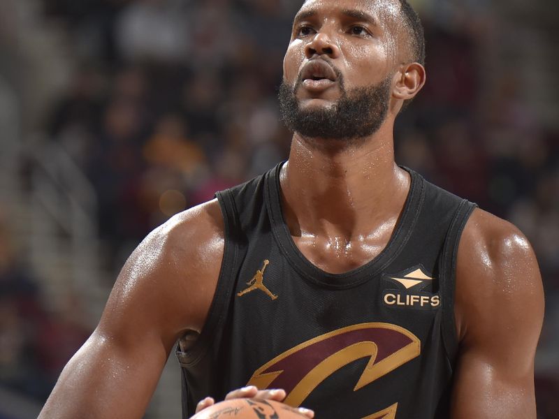 CLEVELAND, OH - NOVEMBER 1: Evan Mobley #4 of the Cleveland Cavaliers prepares to shoot a free throw during the game against the Orlando Magic on November 1, 2024 at Rocket Mortgage FieldHouse in Cleveland, Ohio. NOTE TO USER: User expressly acknowledges and agrees that, by downloading and/or using this Photograph, user is consenting to the terms and conditions of the Getty Images License Agreement. Mandatory Copyright Notice: Copyright 2024 NBAE (Photo by David Liam Kyle/NBAE via Getty Images)