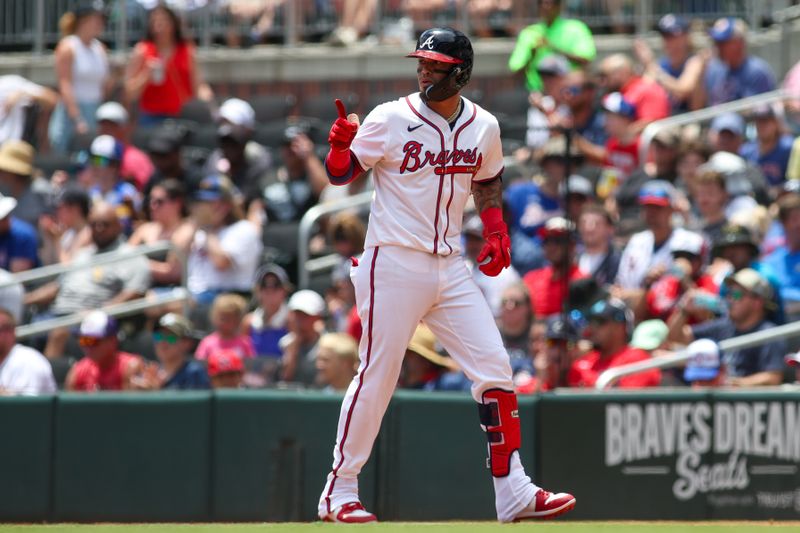 Jul 7, 2024; Atlanta, Georgia, USA; Atlanta Braves shortstop Orlando Arcia (11) reacts after a single against the Philadelphia Phillies in the second inning at Truist Park. Mandatory Credit: Brett Davis-USA TODAY Sports
