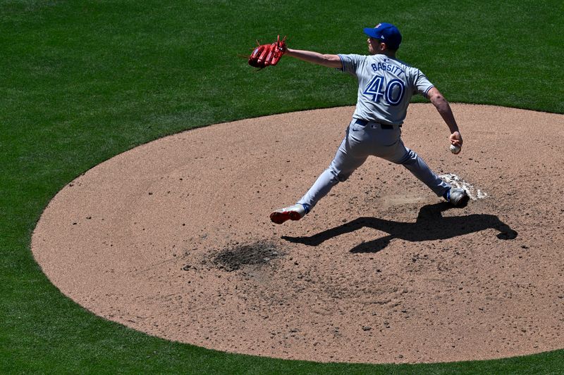Apr 21, 2024; San Diego, California, USA; Toronto Blue Jays starting pitcher Chris Bassitt (40) throws a pitch against the San Diego Padres during the fifth inning at Petco Park. Mandatory Credit: Orlando Ramirez-USA TODAY Sports