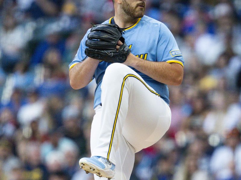 Aug 9, 2024; Milwaukee, Wisconsin, USA;  Milwaukee Brewers pitcher Aaron Civale (32) throws a pitch during the first inning inning against the Cincinnati Reds at American Family Field. Mandatory Credit: Jeff Hanisch-USA TODAY Sports