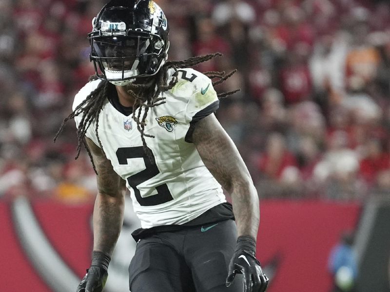 Jacksonville Jaguars safety Rayshawn Jenkins (2) protects the edge as he defend during an NFL football game against the Tampa Bay Buccaneers, Sunday, Dec. 24, 2023, in Tampa, Fla. (AP Photo/Peter Joneleit)