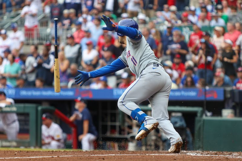 Sep 30, 2024; Atlanta, Georgia, USA; New York Mets second baseman Jose Iglesias (11) hits a RBI single against the Atlanta Braves in the eighth inning at Truist Park. Mandatory Credit: Brett Davis-Imagn Images