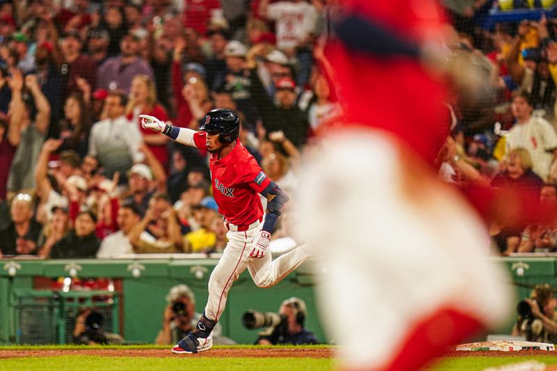 May 31, 2024; Boston, Massachusetts, USA; Boston Red Sox center fielder Ceddanne Rafaela (43) hits a two run home run against the Detroit Tigers in the sixth inning at Fenway Park. Mandatory Credit: David Butler II-USA TODAY Sports