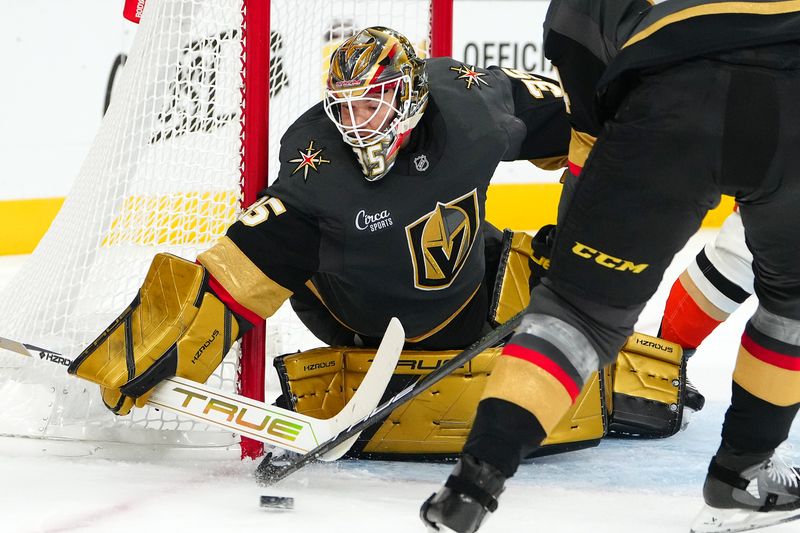 Oct 13, 2024; Las Vegas, Nevada, USA; Vegas Golden Knights goaltender Ilya Samsonov (35) makes a save against the Anaheim Ducks during the third period at T-Mobile Arena. Mandatory Credit: Stephen R. Sylvanie-Imagn Images