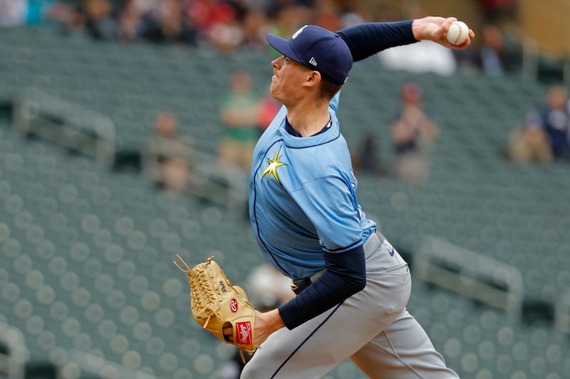 Jun 20, 2024; Minneapolis, Minnesota, USA; Tampa Bay Rays relief pitcher Pete Fairbanks (29) throws to the Minnesota Twins in the ninth inning at Target Field. Mandatory Credit: Bruce Kluckhohn-USA TODAY Sports