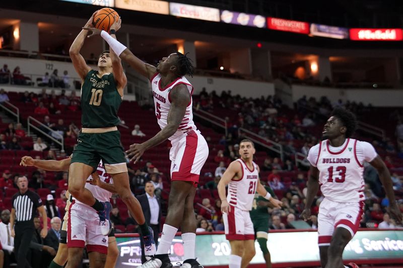 Feb 3, 2024; Fresno, California, USA; Colorado State Rams guard Nique Clifford (10) makes a basket in front of Fresno State Bulldogs guard Jalen Weaver (5) in the first half at the Save Mart Center. Mandatory Credit: Cary Edmondson-USA TODAY Sports