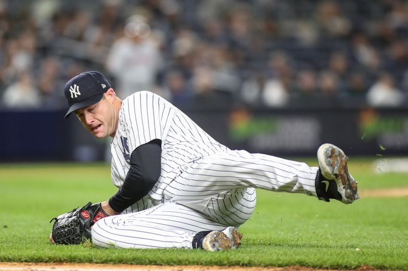 May 2, 2023; Bronx, New York, USA;  New York Yankees starting pitcher Gerrit Cole (45) attempts to make a play on the ball in the sixth inning against the Cleveland Guardians at Yankee Stadium. Mandatory Credit: Wendell Cruz-USA TODAY Sports