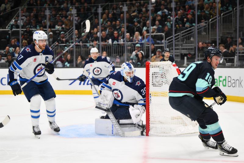 Mar 8, 2024; Seattle, Washington, USA; Winnipeg Jets goaltender Laurent Brossoit (39) defends the goal against the Seattle Kraken during the second period at Climate Pledge Arena. Mandatory Credit: Steven Bisig-USA TODAY Sports